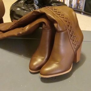 Brown knee high heeled boots